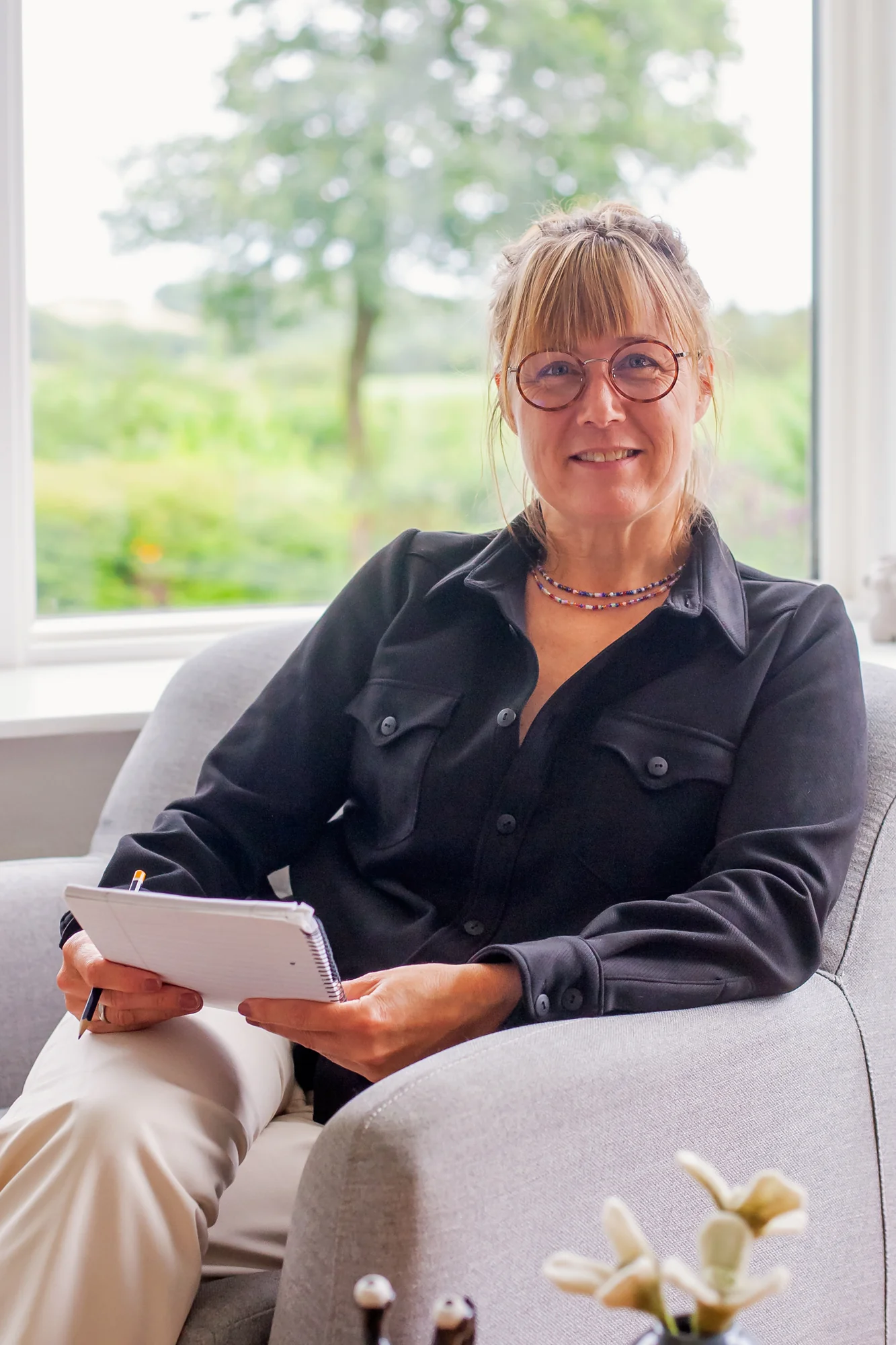 Therapist sitting in open space